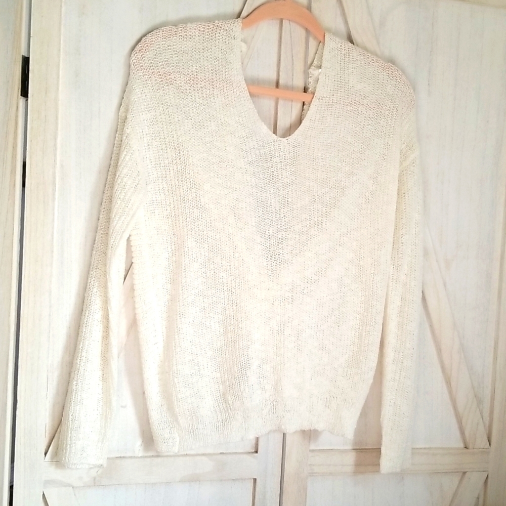 Cream colored open back sweater